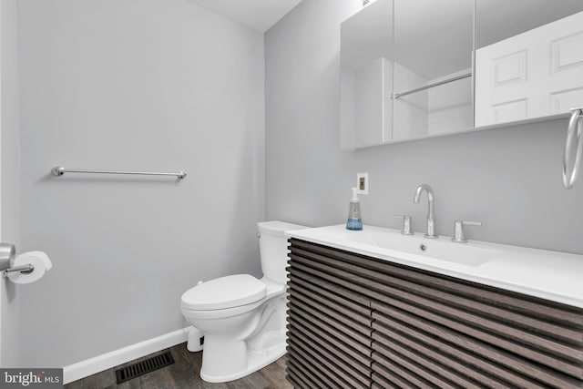 31 Ewing Dr Unit C, Reisterstown, MD 21136 - bathroom featuring wood finished floors and vanity