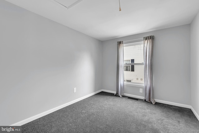 31 Ewing Dr Unit C, Reisterstown, MD 21136 - spare room featuring baseboards and dark colored carpet