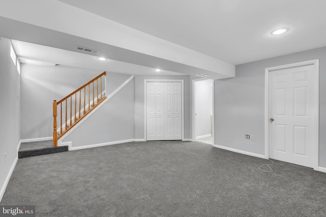 31 Ewing Dr Unit C, Reisterstown, MD 21136 - finished below grade area with dark colored carpet, stairway, and recessed lighting