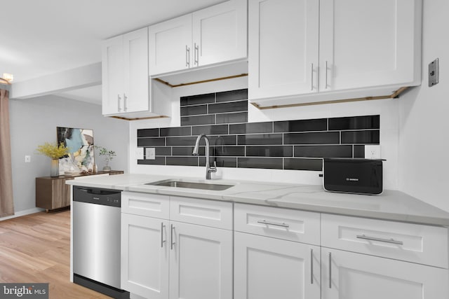 31 Ewing Dr Unit C, Reisterstown, MD 21136 - kitchen with dishwasher, decorative backsplash, white cabinets, and light wood finished floors