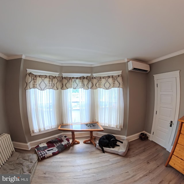 731 W Main St, Leesport, PA 19533 - interior space with a wall unit AC, wood finished floors, and ornamental molding