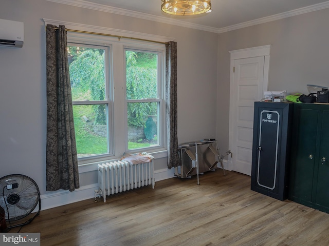 731 W Main St, Leesport, PA 19533 - misc room featuring radiator, a wall mounted air conditioner, ornamental molding, light wood-style floors, and a chandelier