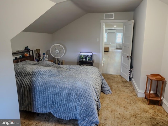 731 W Main St, Leesport, PA 19533 - bedroom featuring a wall mounted air conditioner, carpet flooring, radiator heating unit, and lofted ceiling