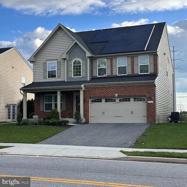 5733 Allender Rd, White Marsh, MD 21162 - traditional home featuring brick siding, a front yard, and driveway