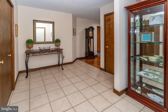 27 Arnold Dr, Princeton Junction, NJ 08550 - corridor featuring baseboards and a textured ceiling
