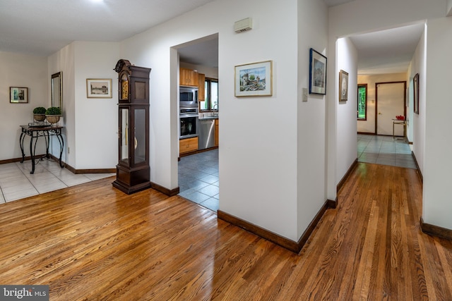 27 Arnold Dr, Princeton Junction, NJ 08550 - hall with light wood-style floors and baseboards