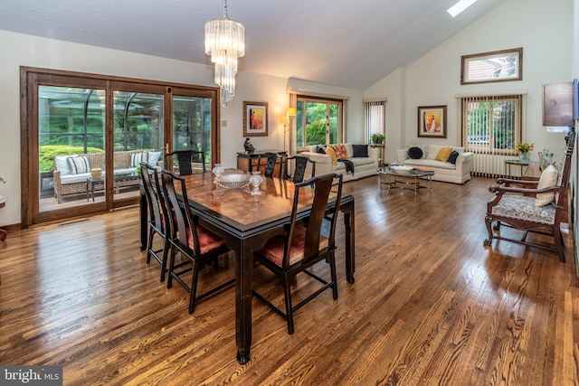 27 Arnold Dr, Princeton Junction, NJ 08550 - dining space featuring a chandelier, wood finished floors, and high vaulted ceiling