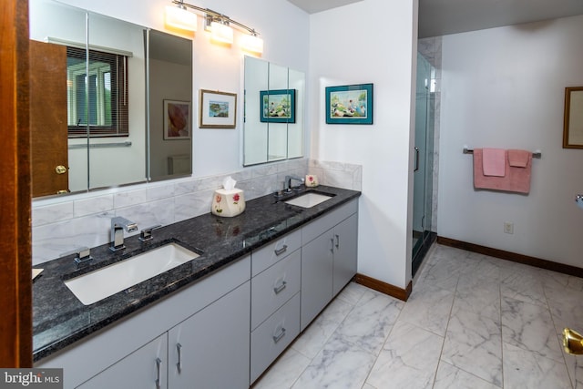 27 Arnold Dr, Princeton Junction, NJ 08550 - bathroom featuring marble finish floors, double vanity, a shower stall, and backsplash