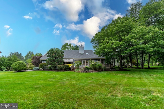 27 Arnold Dr, Princeton Junction, NJ 08550 - view of green lawn featuring a porch