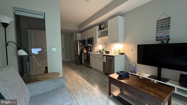 12340 Rosslare Ridge Rd Unit 204, Lutherville Timonium, MD 21093 - living room with light wood finished floors