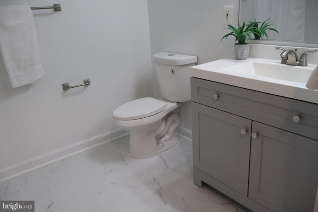 12340 Rosslare Ridge Rd Unit 204, Lutherville Timonium, MD 21093 - bathroom featuring baseboards, vanity, marble finish floors, and toilet