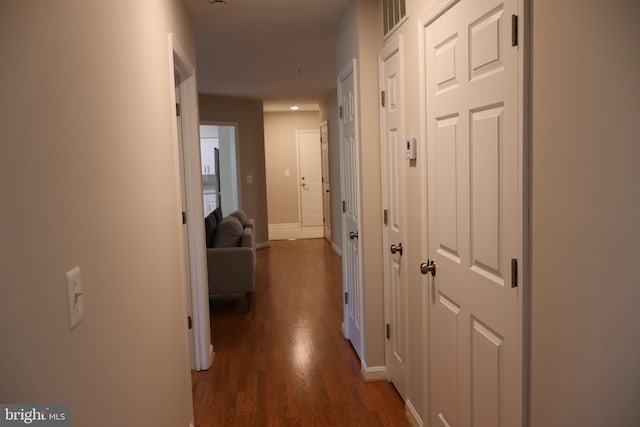 12340 Rosslare Ridge Rd Unit 204, Lutherville Timonium, MD 21093 - hallway with dark wood finished floors and baseboards