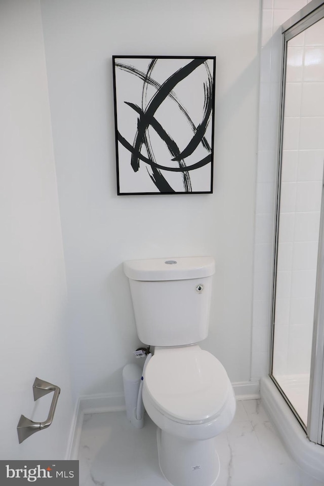 12340 Rosslare Ridge Rd Unit 204, Lutherville Timonium, MD 21093 - full bath featuring marble finish floors, baseboards, toilet, and a stall shower