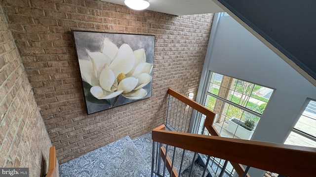 12340 Rosslare Ridge Rd Unit 204, Lutherville Timonium, MD 21093 - staircase featuring brick wall