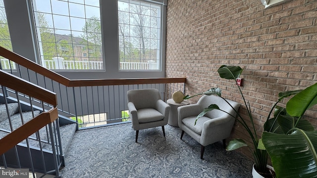 12340 Rosslare Ridge Rd Unit 204, Lutherville Timonium, MD 21093 - sitting room featuring brick wall, carpet, and stairway
