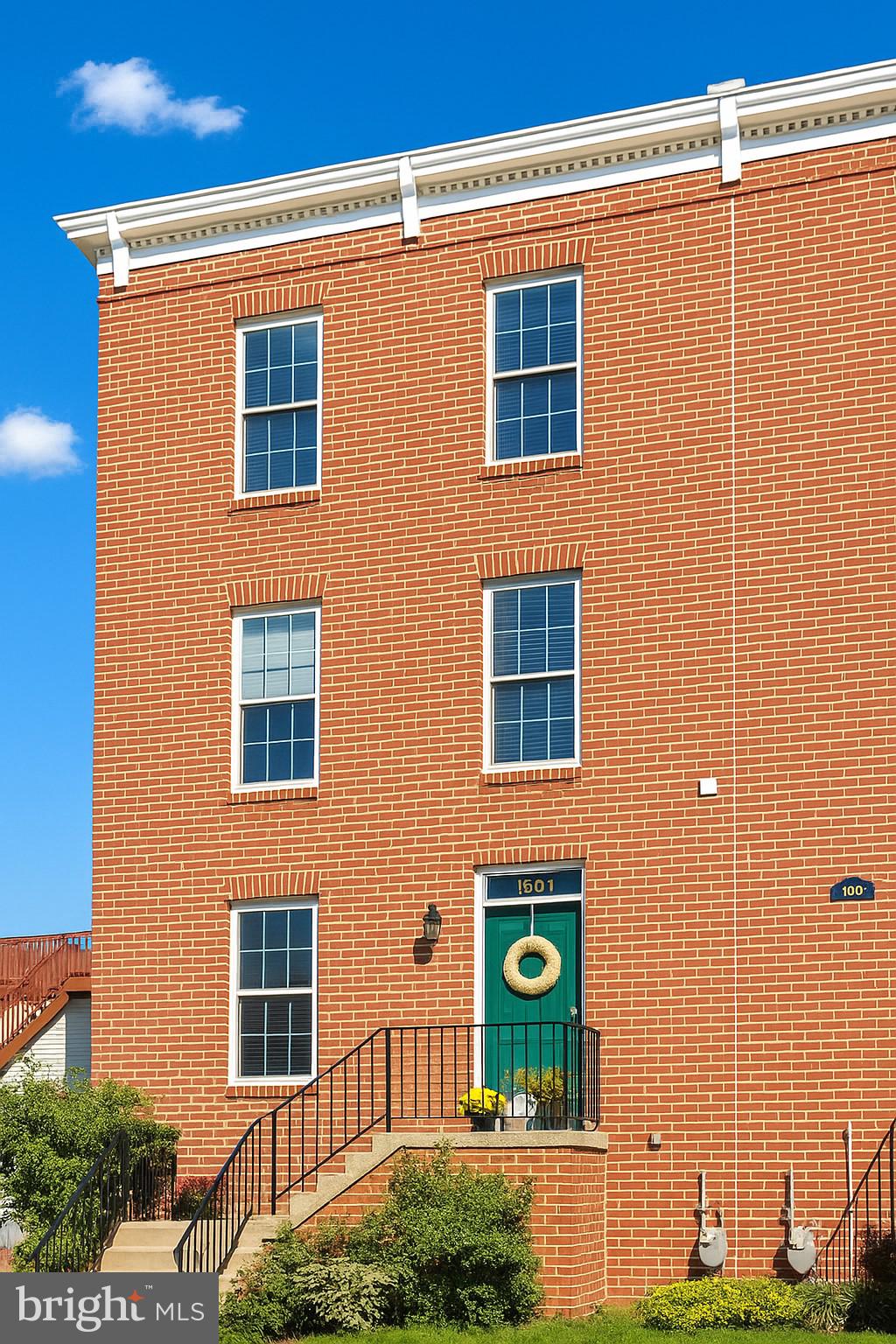 1501 Stack St, Baltimore, MD 21230 - view of front of property featuring brick siding and stairway