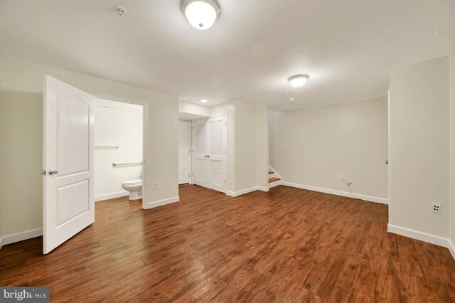 1501 Stack St, Baltimore, MD 21230 - basement featuring stairs, wood finished floors, and recessed lighting
