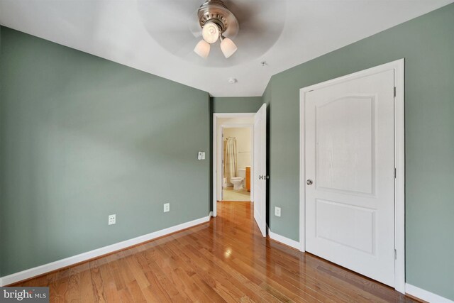 1501 Stack St, Baltimore, MD 21230 - unfurnished bedroom featuring wood finished floors and ceiling fan