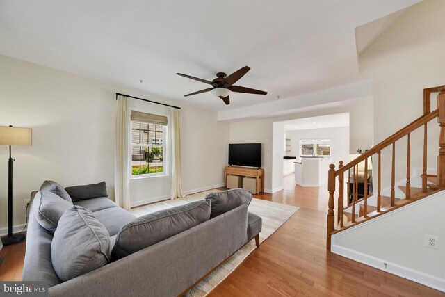1501 Stack St, Baltimore, MD 21230 - living area featuring a ceiling fan, stairs, and wood finished floors