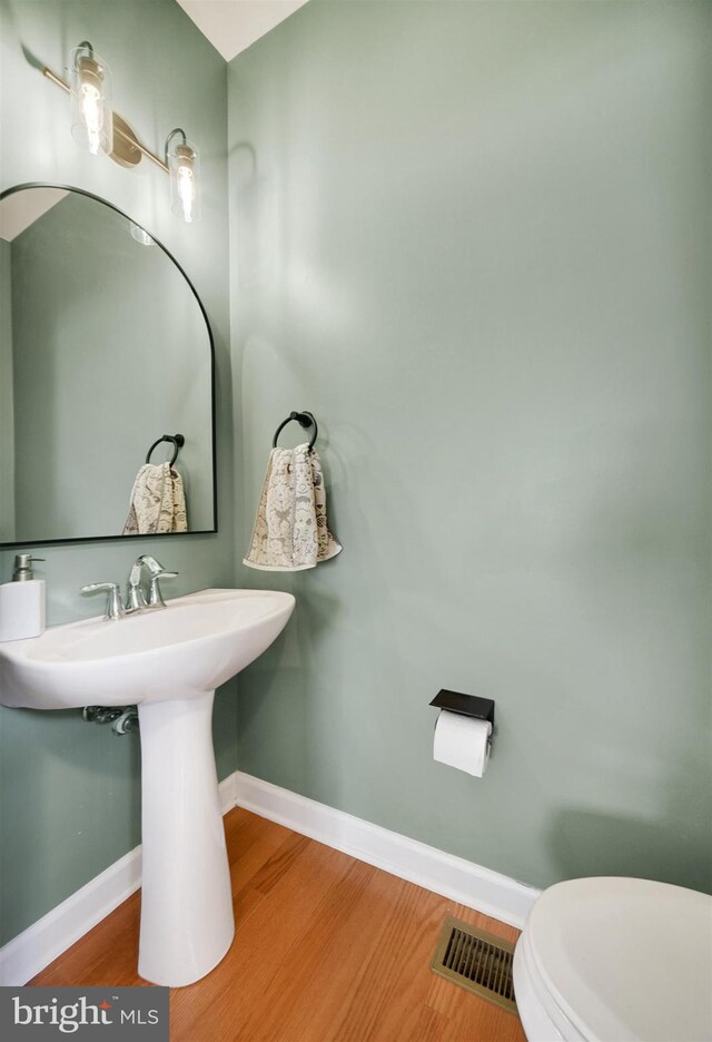 1501 Stack St, Baltimore, MD 21230 - bathroom with wood finished floors
