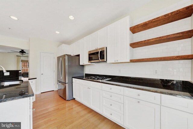 1501 Stack St, Baltimore, MD 21230 - kitchen featuring appliances with stainless steel finishes, open shelves, white cabinets, decorative backsplash, and recessed lighting