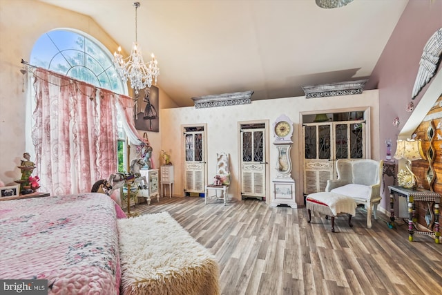 947 Martin Rd, Baltimore, MD 21221 - bedroom with high vaulted ceiling, a chandelier, and wood finished floors