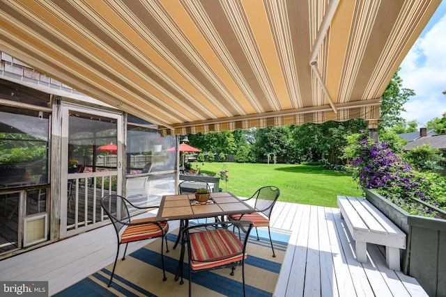 12 Hatsawap Rd, Cambridge, MD 21613 - wooden deck with outdoor dining space and a yard