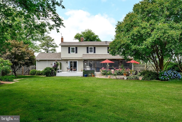 12 Hatsawap Rd, Cambridge, MD 21613 - rear view of property with a chimney, a sunroom, and a shingled roof