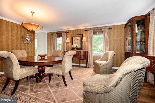 12 Hatsawap Rd, Cambridge, MD 21613 - dining area with wallpapered walls, plenty of natural light, crown molding, and baseboards