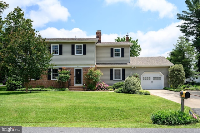 12 Hatsawap Rd, Cambridge, MD 21613 - view of front of property with a garage, a chimney, a front lawn, and driveway