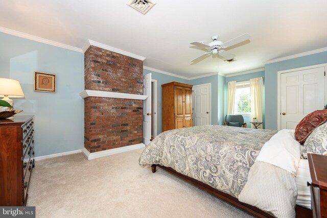 12 Hatsawap Rd, Cambridge, MD 21613 - bedroom with carpet floors, ornamental molding, baseboards, a ceiling fan, and multiple closets