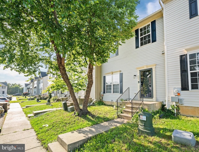 605 Red Timber Ln, Smyrna, DE 19977 - townhome / multi-family property featuring a residential view