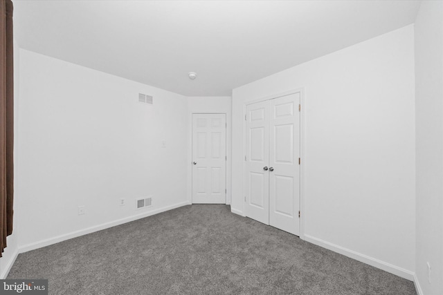605 Red Timber Ln, Smyrna, DE 19977 - unfurnished bedroom featuring carpet and a closet