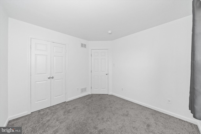 605 Red Timber Ln, Smyrna, DE 19977 - unfurnished bedroom featuring carpet floors and a closet