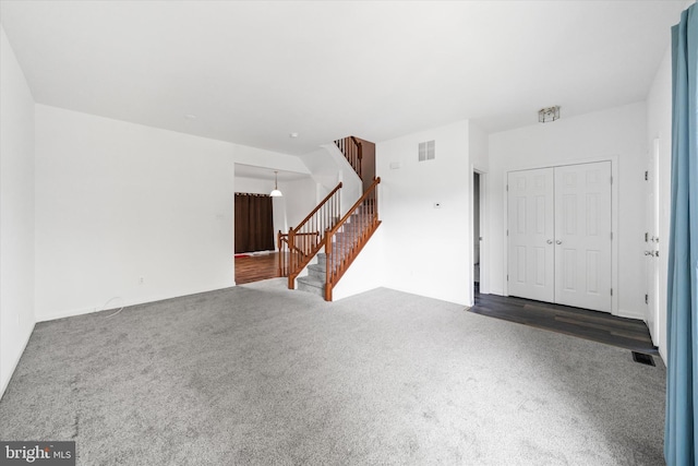605 Red Timber Ln, Smyrna, DE 19977 - carpeted foyer with stairs