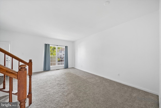 605 Red Timber Ln, Smyrna, DE 19977 - unfurnished room with carpet floors and stairway