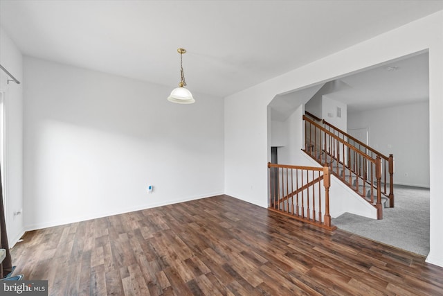 605 Red Timber Ln, Smyrna, DE 19977 - unfurnished room with wood finished floors and stairs