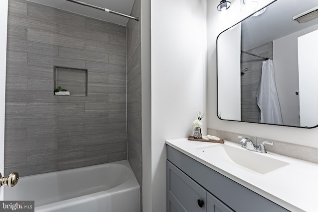 7910 Peyton Forest Trl, Annandale, VA 22003 - bathroom featuring vanity and shower / tub combo with curtain