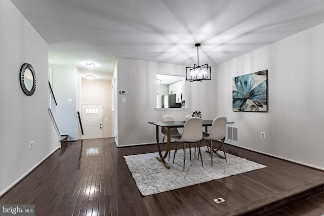7910 Peyton Forest Trl, Annandale, VA 22003 - dining room with dark wood finished floors and a chandelier