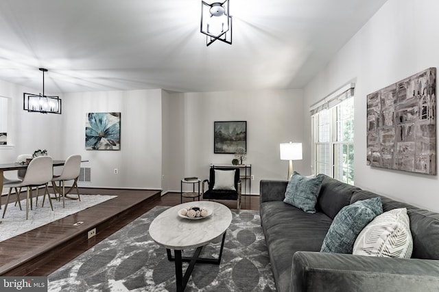 7910 Peyton Forest Trl, Annandale, VA 22003 - living area featuring a chandelier and wood finished floors