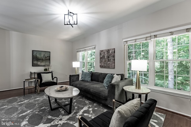 7910 Peyton Forest Trl, Annandale, VA 22003 - living room with wood finished floors and a chandelier