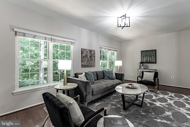 7910 Peyton Forest Trl, Annandale, VA 22003 - living area with dark wood-type flooring and a chandelier