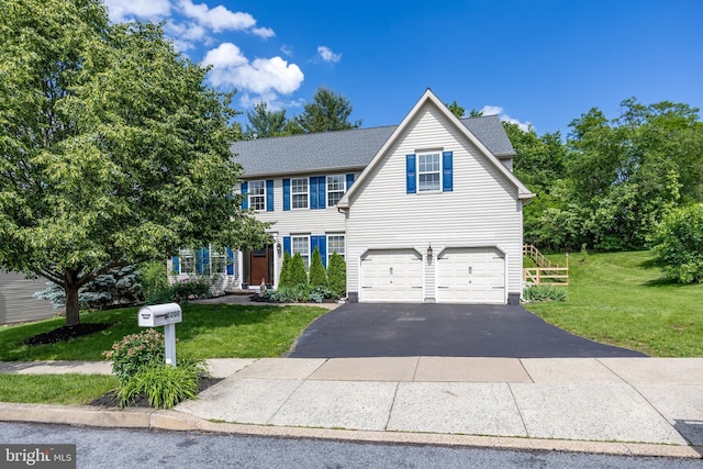 2200 Summerdale Ln, Linfield, PA 19468 - view of front facade with asphalt driveway, a garage, a front lawn, and roof with shingles