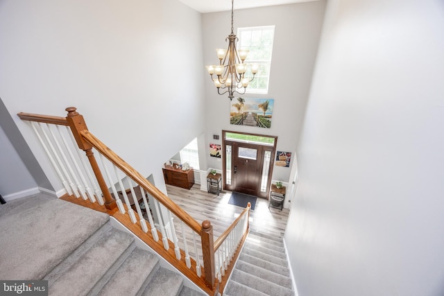 2200 Summerdale Ln, Linfield, PA 19468 - entrance foyer featuring a chandelier, a high ceiling, baseboards, and stairs