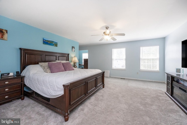 2200 Summerdale Ln, Linfield, PA 19468 - bedroom with light colored carpet, ceiling fan, and baseboards