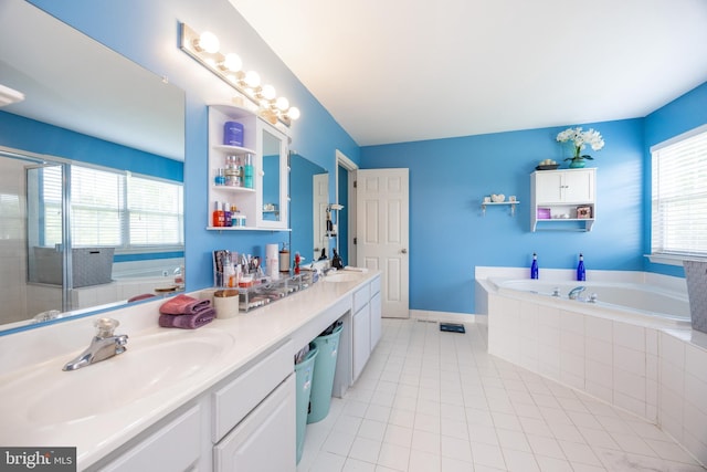 2200 Summerdale Ln, Linfield, PA 19468 - full bathroom with a bath, tile patterned flooring, double vanity, a stall shower, and baseboards