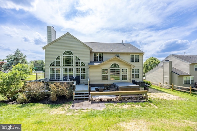 2200 Summerdale Ln, Linfield, PA 19468 - rear view of property with a chimney, a wooden deck, and a hot tub