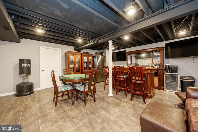 2200 Summerdale Ln, Linfield, PA 19468 - dining space with beverage cooler, a dry bar, and baseboards