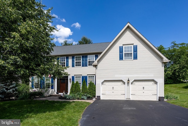 2200 Summerdale Ln, Linfield, PA 19468 - view of front of home with an attached garage, driveway, and a front yard