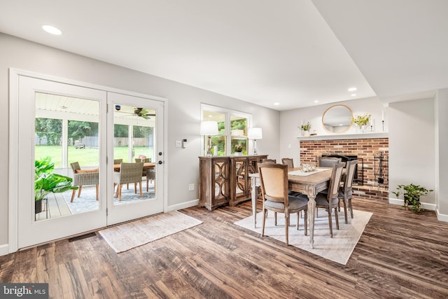 1576 Delong Dr, Downingtown, PA 19335 - dining area with wood finished floors, baseboards, recessed lighting, and a fireplace